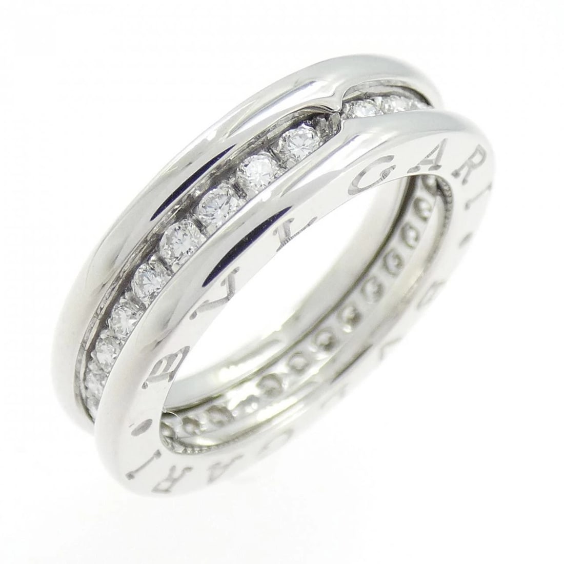 BVLGARI B.ZERO1 1 BAND RING: BVLGARI B.zero1 1 Band Ring Brand: BVLGARI Type: Ring Material: 750 White Gold, Main Stone/Creation Natural Color: White Gold Size: 4.5-5 US Accessories: None Accessories Notice: When