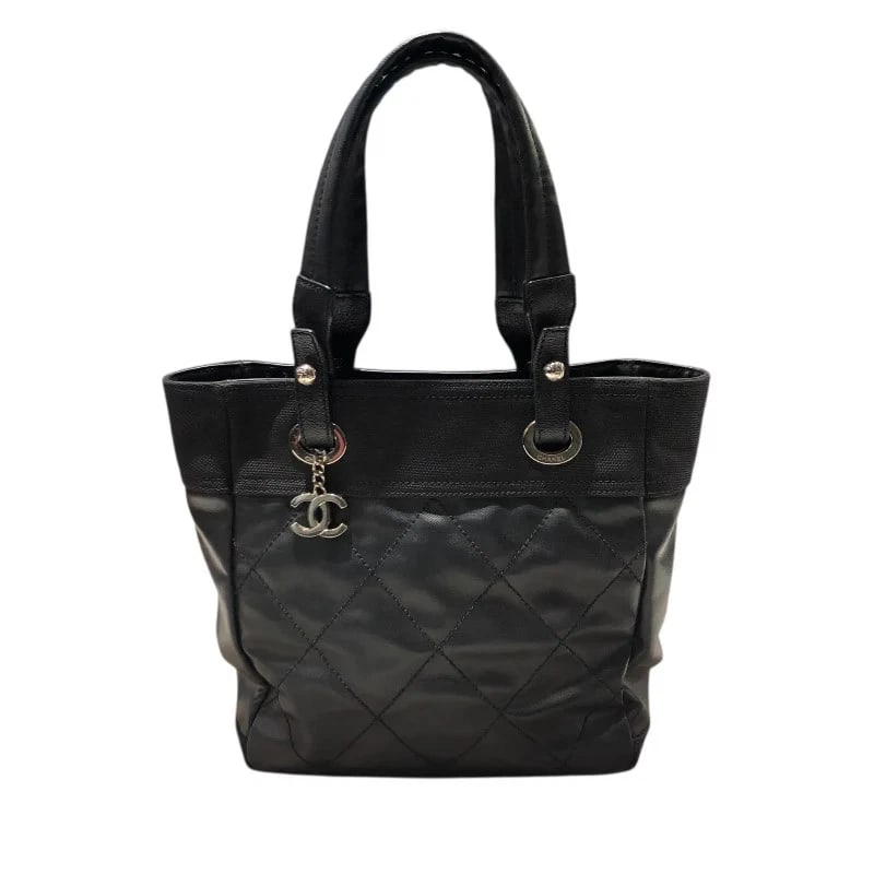 CHANEL PARIS BIARRITZ TOTE PM BLACK COATED CANVAS HANDBAG: CHANEL Paris Biarritz Tote PM Black Coated Canvas Handbag Brand: CHANEL Type: Handbag Material: Coated Canvas Color: black Size: W: 25cm / H: 27cm / D: 10cm Accessories: None Accessories N