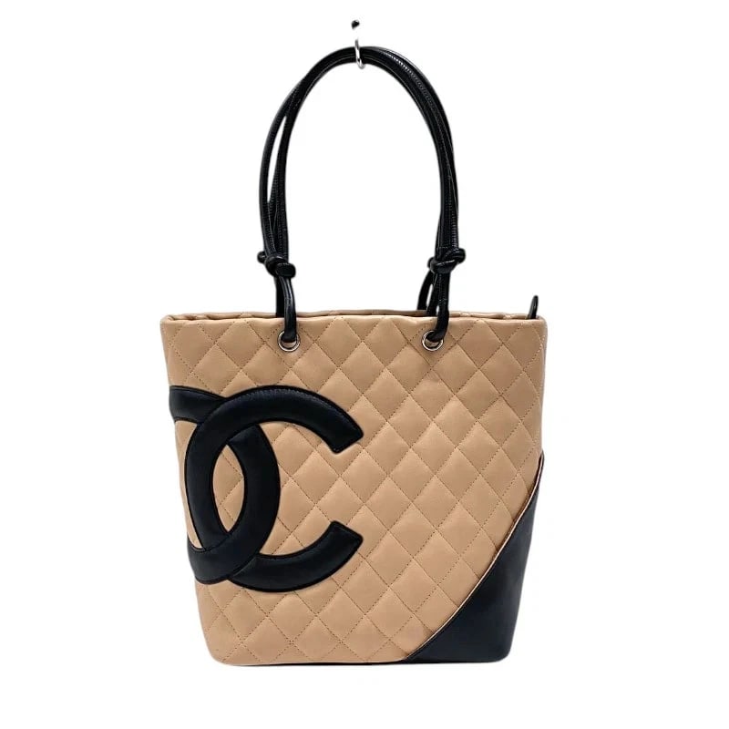 CHANEL CAMBON LINE TOTE PM BEIGE BLACK CALF HANDBAG: CHANEL Cambon Line Tote PM Beige Black Calf Handbag Brand: CHANEL Type: Handbag Material: Calf Color: Beige x Black Size: W: 20-28cm / H: 23.5cm / D: 12cm Accessories: None Accessories Not