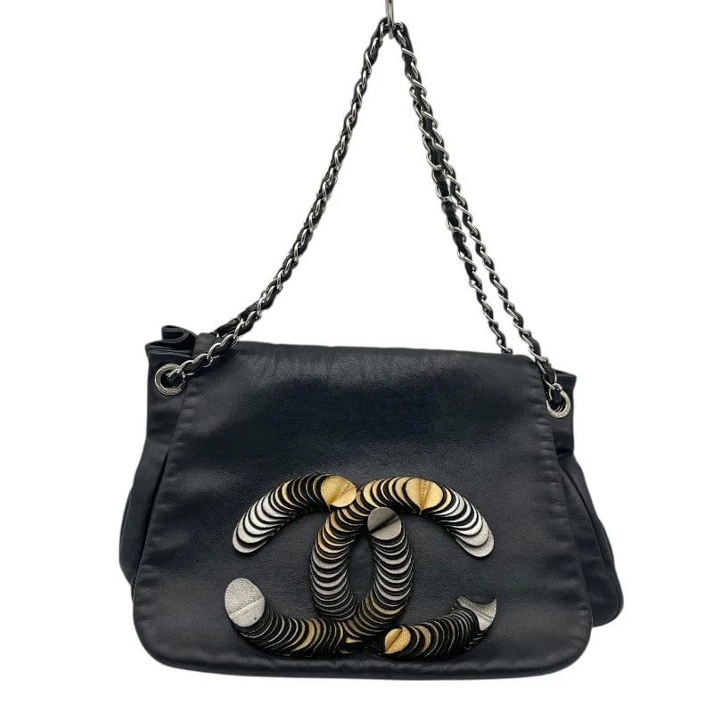 CHANEL CC DISC BON BON 12 SERIES BLACK SVXGHW LAMBSKI HANDBAG: CHANEL CC Disc Bon Bon 12 Series Black SVxGHW Lambski Handbag Brand: CHANEL Type: Handbag Material: Rum Color: Black SVxGD Hardware Size: W: 35cm / H: 25cm / D: 16cm Accessories: None Acce