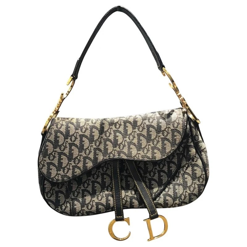 CHRISTIAN DIOR TROTTER SADDLE BAG NAVY/GHW TROTTER CANVAS HANDBAG: Christian Dior Trotter Saddle Bag Navy/GHW Trotter Canvas Handbag Brand: CHRISTIAN DIOR Type: Handbag Material: Trotter Canvas Color: Navy // GD Hardware Size: W: 30cm / H: 17.5cm / D: 6cm Access