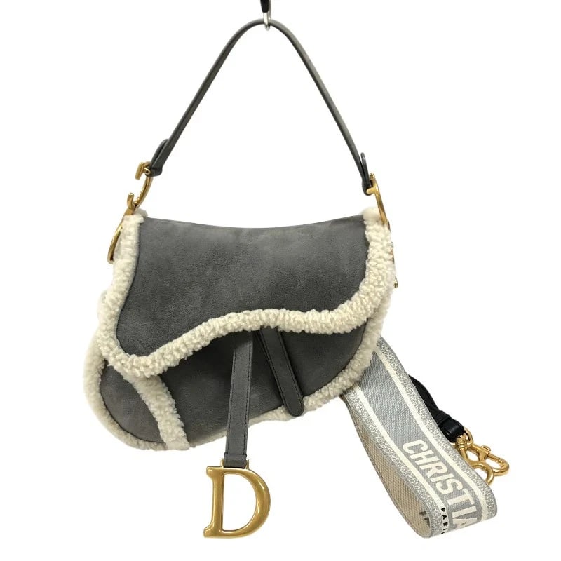 CHRISTIAN DIOR SADDLE BAG GREY GHW MOUTON LEATHER HANDBAG: Christian Dior Saddle Bag Grey GHW Mouton Leather Handbag Brand: CHRISTIAN DIOR Type: Handbag Material: Mouton Leather Color: Gray/GD Hardware Size: W: 23cm / H: 20cm / D: 7cm Accessories: None