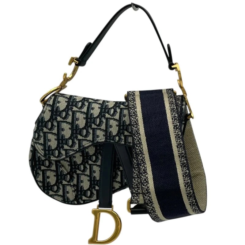 CHRISTIAN DIOR SADDLE BAG MINI NAVY OBLIQUE JACQUARD HANDBAG: Christian Dior Saddle Bag Mini Navy Oblique Jacquard Handbag Brand: CHRISTIAN DIOR Type: Handbag Material: Oblique Jacquard Color: Navy Size: W: 17.5cm / H: 14cm / D: 2.5cm / Shoulder: 94.5cm Acc
