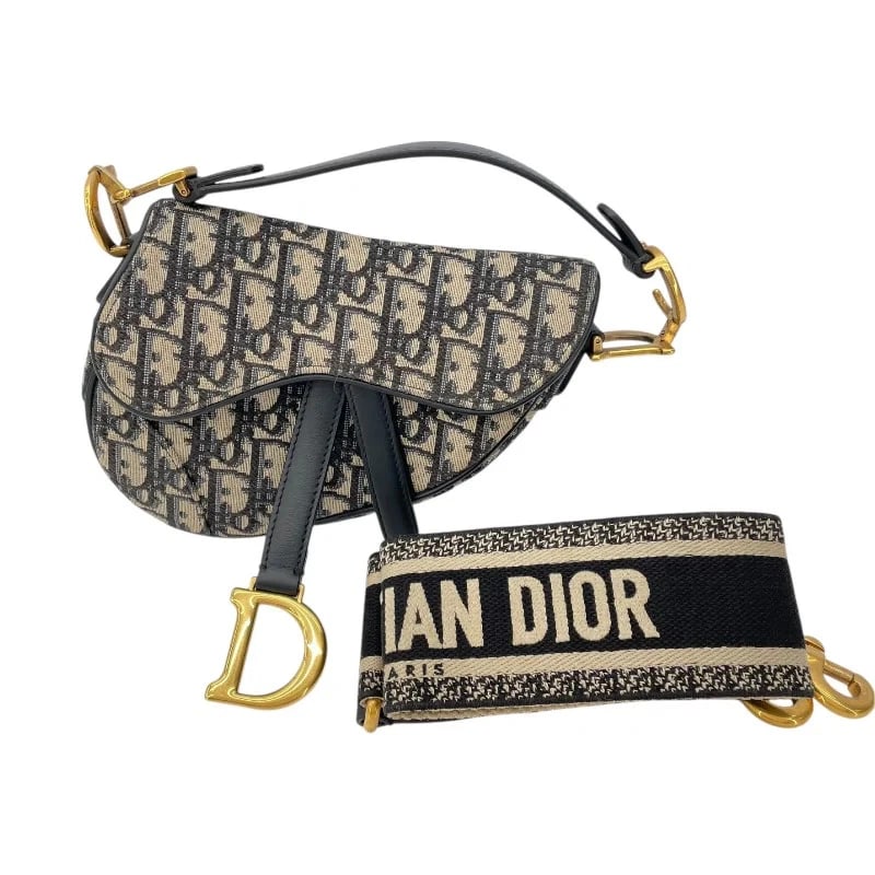 CHRISTIAN DIOR MINI SADDLE BAG OBLIQUE JACQUARD HANDBAG: Christian Dior Mini Saddle Bag Oblique Jacquard Handbag Brand: CHRISTIAN DIOR Type: Handbag Material: Oblique Jacquard Color: Navy Ivory GD Hardware Size: W: 20cm / H: 15cm / D: 5cm Accessories: