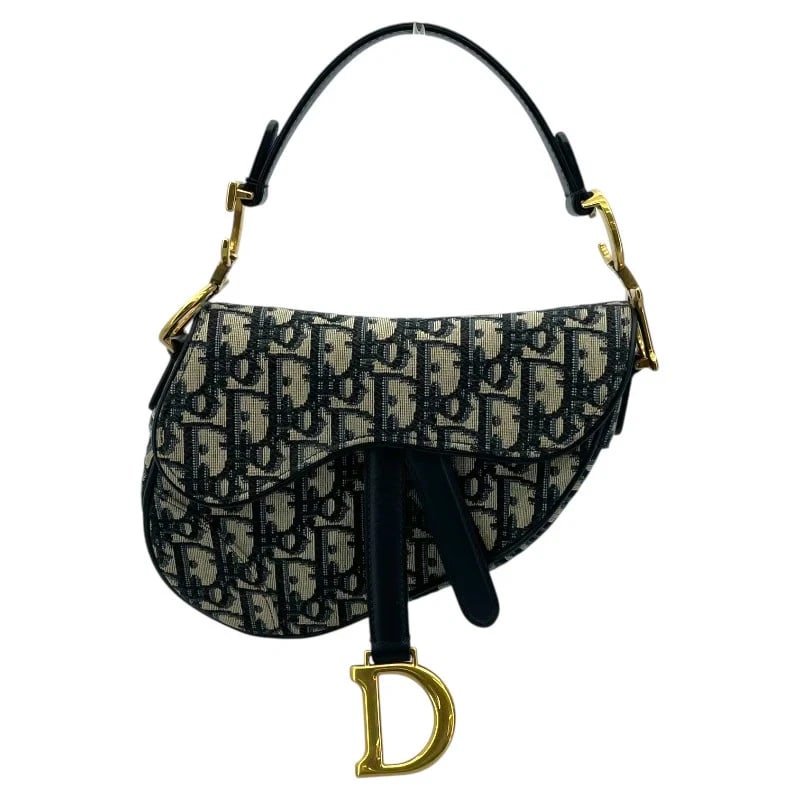 CHRISTIAN DIOR SADDLE MINI BAG OBLIQUE JACQUARD HANDBAG: Christian Dior Saddle Mini Bag Oblique Jacquard Handbag Brand: CHRISTIAN DIOR Type: Handbag Material: Oblique Jacquard Color: Navy Ivory GD Hardware Size: W: 20cm / H: 15cm / D: 4cm / Shoulder: 93