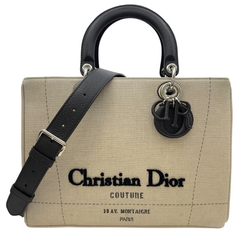 CHRISTIAN DIOR LADY DIOR LARGE ETOILE CRUISE CANVAS/LEATHER HANDBAG: Christian Dior Lady Dior Large Etoile Cruise Canvas/Leather Handbag Brand: CHRISTIAN DIOR Type: Handbag Material: Canvas/Leather Color: Ivory/SV Hardware Size: W: 32cm / H: 23cm / D: 12cm Accesso