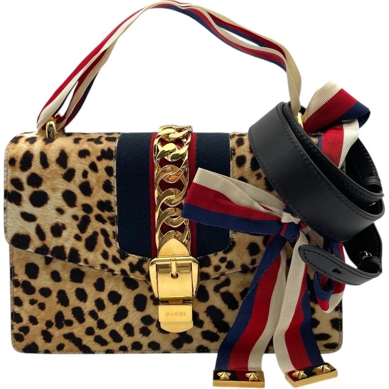 GUCCI SYLVIE LEOPARD CALF HAIR/LEATHER HANDBAG: GUCCI Sylvie Leopard Calf Hair/Leather Handbag Brand: GUCCI Type: Handbag Material: Harako/Leather Color: Leopard Size: W: 25.5cm / H: 15.5cm / D: 8cm / Shoulder: 68cm Accessories: None Ac