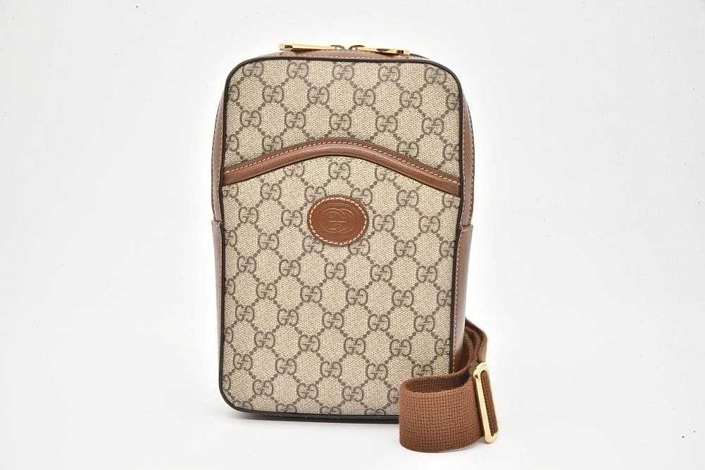 GUCCI GG SUPREME SLING BAG INTERLOCKING G HANDBAG: Gucci GG Supreme Sling Bag Interlocking G Handbag Brand: Gucci Type: Handbag Material: Coated Canvas, Leather Color: Beige/Ebony Brown Size: W16xH23xD5cm / Shoulder: 70-111cm Accessories: None