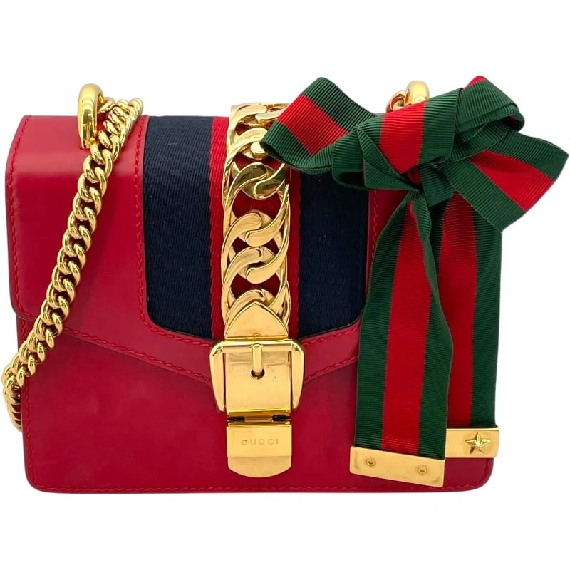 GUCCI SYLVIE MINI CHAIN BAG RED LEATHER/CANVAS HANDBAG: GUCCI Sylvie Mini Chain Bag Red Leather/Canvas Handbag Brand: GUCCI Type: Handbag Material: Leather/Canvas Color: Red Size: W: 18.5cm / H: 13cm / D: 8cm / Shoulder: 100cm Accessories: None