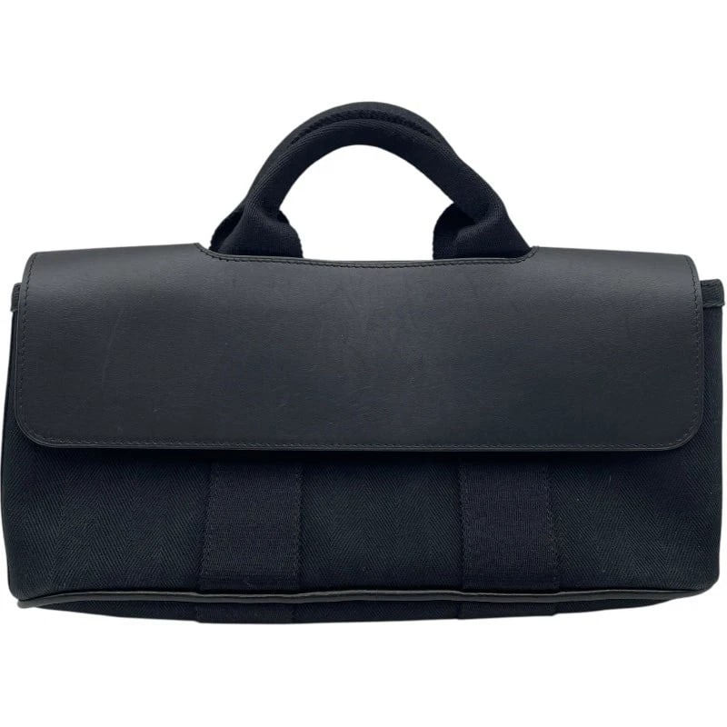 HERMES VALPARAISO LONG PM BLACK SHW TOILE HANDBAG: Hermes Valparaiso Long PM Black SHW Toile Handbag Brand: HERMES Type: Handbag Material: Toile Color: Black SV Hardware Size: W: 30cm / H: 16cm / D: 5.5cm Accessories: None Accessories Noti