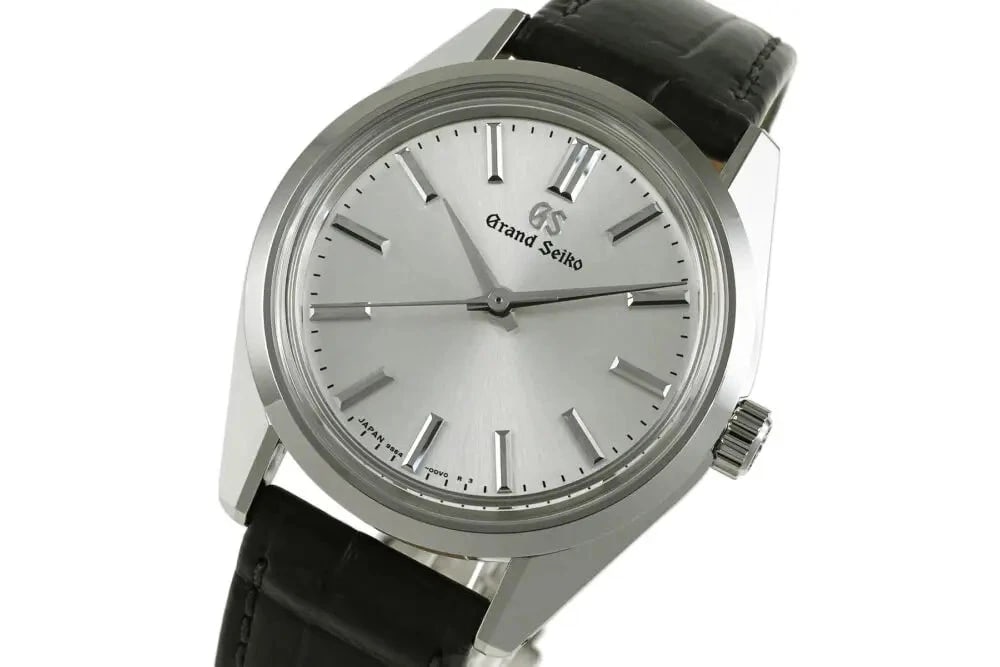 SEIKO GRAND HERITAGE COLLECTION WATCH: SEIKO Grand Heritage Collection Watch Brand: SEIKO Type: Wrist watch Material: Case Material SS Band Material Genuine Leather Belt, D-Buckle Color: Dial Color Silver Size: Case Size 36.5mm