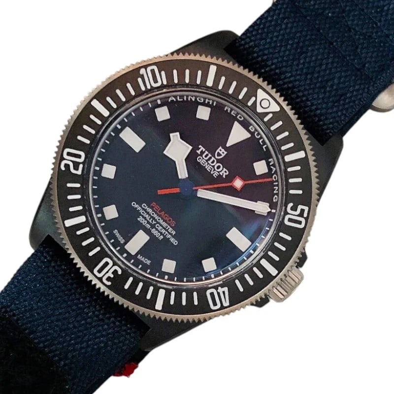 TUDOR PELAGOS TITANIUM CARBON WATCH: Tudor Pelagos Titanium Carbon Watch Brand: TUDOR Type: Wrist watch Material: Titanium/Carbon Color: Dial Color Navy Size: [ Case size ] 42mm / Case shape: Round face / Case width: 42mm / Case