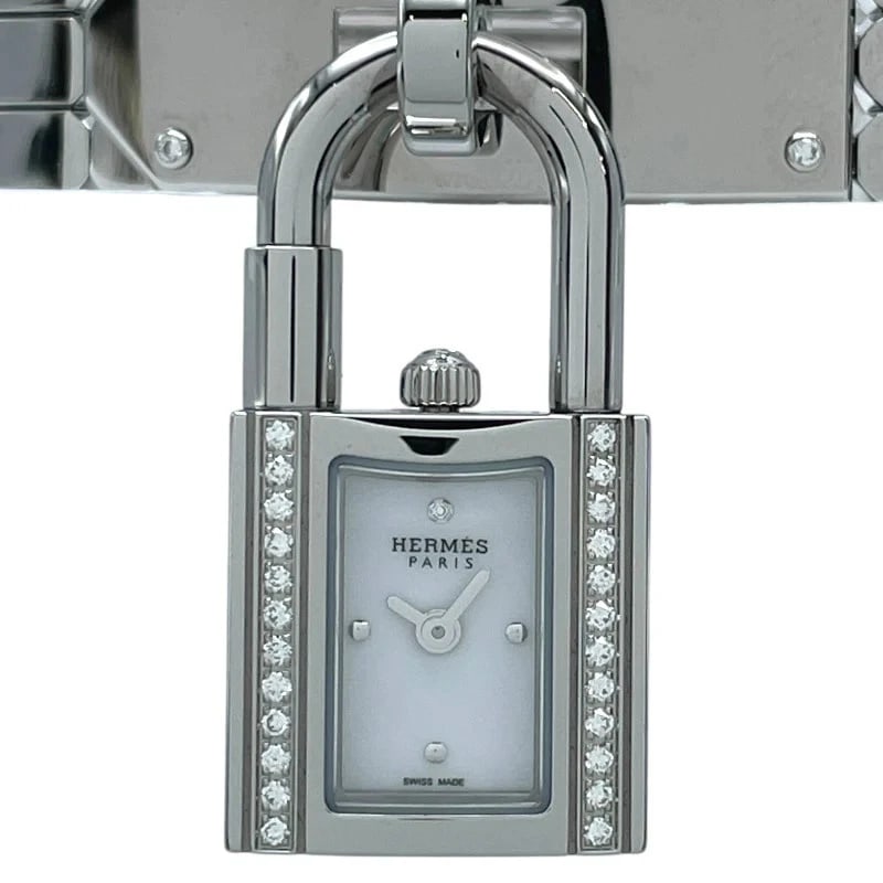HERMÈS KELLY WATCH WHITE WATCH: Hermès Kelly Watch White Watch Brand: HERMÈS Type: Wrist watch Material: SS Color: Dial Color White Size: [ Case size ] / Case shape: Square face / Case width: 16.4mm / Case height: 32mm / Case