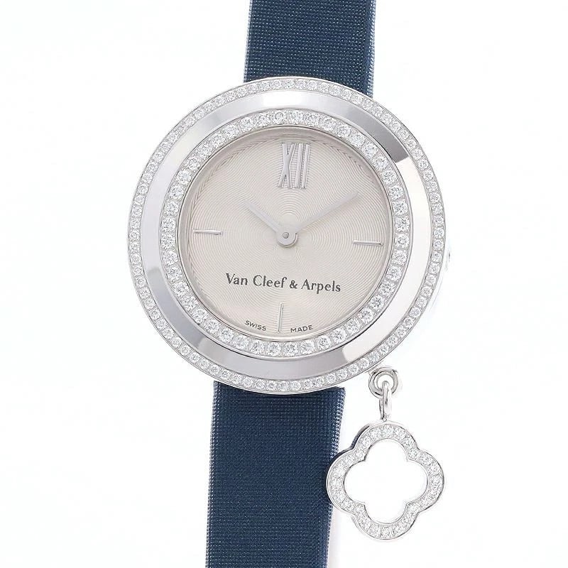 VAN CLEEF & ARPELS CHARM MINI WATCH: Van Cleef & Arpels Charm Mini Watch Brand: VAN CLEEF & ARPELS Type: Wrist watch Material: Case Material 18K White Gold Band Material Satin/18K white gold buckle Color: Dial Color Silver Size: