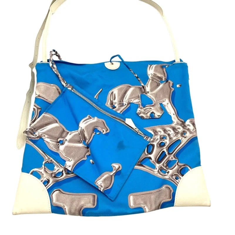 HERMES SILKY CITY BLUE SILK HANDBAG: HERMES Silky City Blue Silk Handbag Brand: HERMES Type: Handbag Material: Silk Color: blue Size: W: 32cm / H: 32cm / D: 3cm / Shoulder: 60-100cm Accessories: None Accessories Notice: When