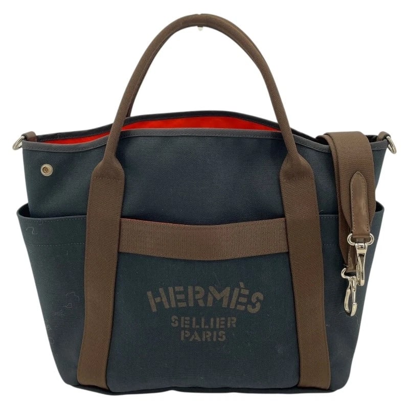HERMES SAC DE PANSAGE STAMP NAVY SHW TOILE TOTE HANDBAG: HERMES Sac de Pansage Stamp Navy SHW Toile Tote Handbag Brand: HERMES Type: Handbag Material: Toile Color: Navy/SV Hardware Size: W: 38cm / H: 33cm / D: 16cm / Shoulder: 97cm Accessories: None