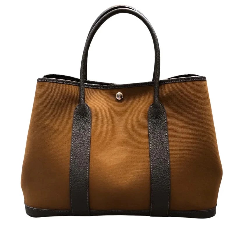 HERMES GARDEN PARTY STAMP ARZANE EBENE HANDBAG: HERMES Garden Party Stamp Arzane Ebene Handbag Brand: HERMES Type: Handbag Material: Toile Color: Arzan-Ebene SV Size: W: 36.5cm / H: 26cm / D: 18cm Accessories: None Accessories Notice: W