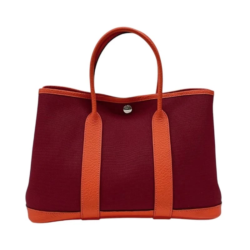 HERMES GARDEN PARTY TPM ROUGE GRENADE & ORANGE POPPY TOILE NEGONDA HANDBAG: HERMES Garden Party TPM Rouge Grenade & Orange Poppy Toile Negonda Handbag Brand: HERMES Type: Handbag Material: Toile/Negonda Color: Rouge Grenat x Orange Poppy Size: W: 30cm / H: 21cm / D: 13cm
