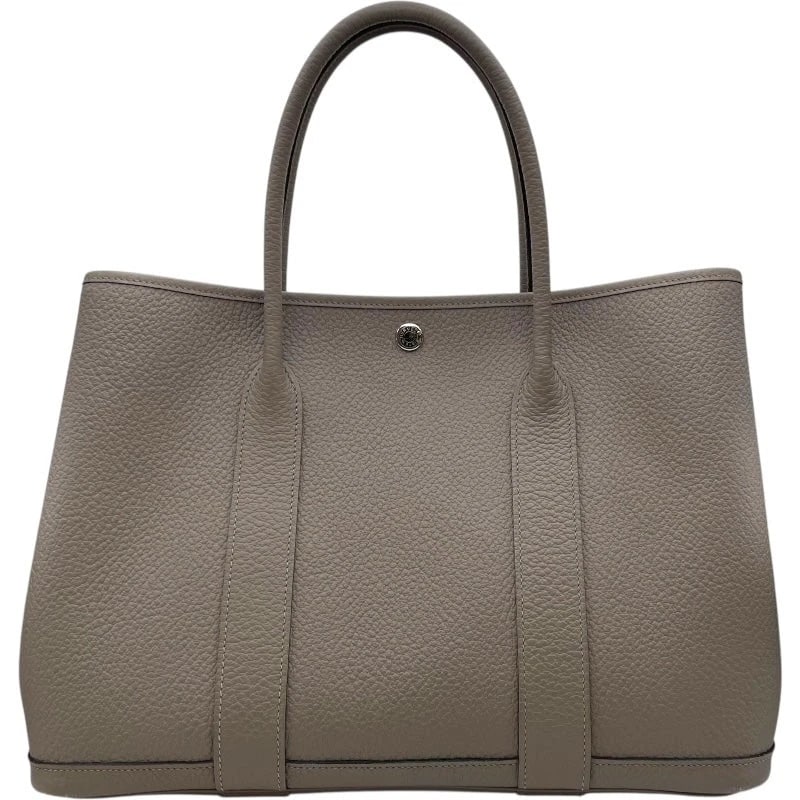 HERMES GARDEN PARTY PM C STAMP TAURILLON CLEMENCE SHW HANDBAG: HERMES Garden Party PM C Stamp Taurillon Clemence SHW Handbag Brand: HERMES Type: Handbag Material: Country Color: Tourtiere SV Hardware Size: W: 36cm / H: 27cm / D: 17.5cm Accessories: None <