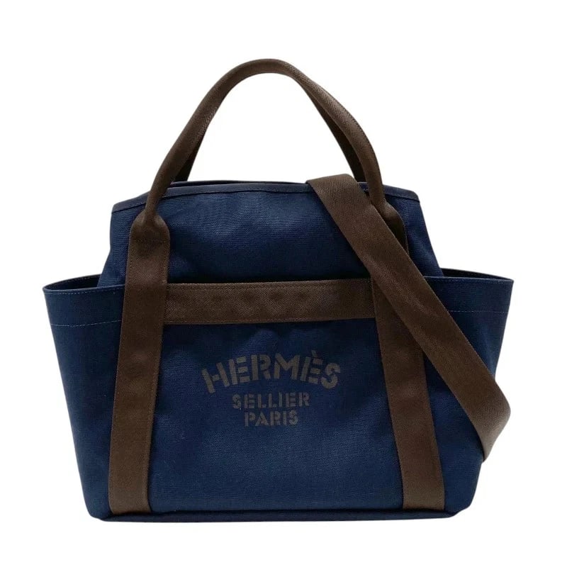 HERMES SAC DE PANSAGE Z STAMP NAVY BROWN TOILE HANDBAG: HERMES Sac de Pansage Z Stamp Navy Brown Toile Handbag Brand: HERMES Type: Handbag Material: Toile Color: Navy x Brown Size: W: 38cm / H: 34cm / D: 15cm / Shoulder: 94cm Accessories: None