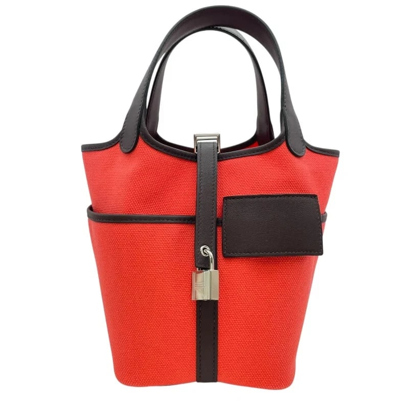 HERMES PICOTIN LOCK PM CARGO B STAMP ROUGE SELLIER HANDBAG: HERMES Picotin Lock PM Cargo B Stamp Rouge Sellier Handbag Brand: HERMES Type: Handbag Material: Towargoelan/Swift Color: Rouge Serie x Rose Texas SV Hardware Size: W: 18cm / H: 18cm / D: 13cm Ac