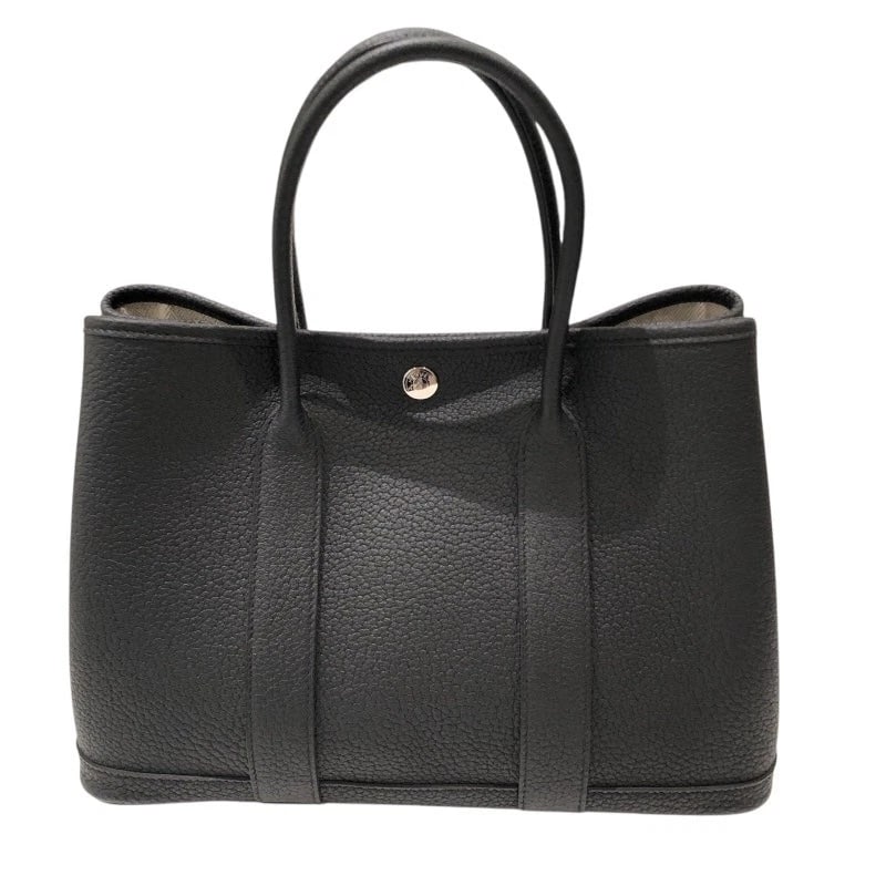 HERMES GARDEN PARTY TPM W STAMP BLACK NEGONDA LEATHER HANDBAG: Hermes Garden Party TPM W Stamp Black Negonda Leather Handbag Brand: HERMES Type: Handbag Material: Negonda Color: black Size: W: 30cm / H: 21cm / D: 14cm Accessories: None Accessories Not