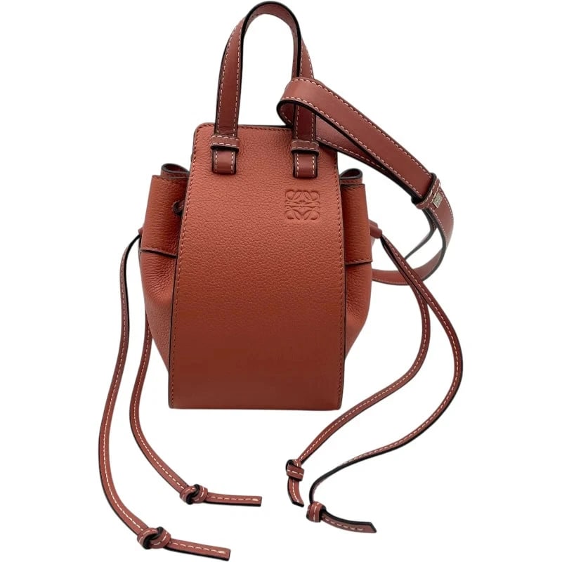 LOEWE HAMMOCK DRAWSTRING MINI SALMON PINK SHW HANDBAG: LOEWE Hammock Drawstring Mini Salmon Pink SHW Handbag Brand: LOEWE Type: Handbag Material: Leather Color: Salmon Pink SV Hardware Size: W: 11cm / H: 20cm / D: 15cm / Shoulder: 104-120cm 