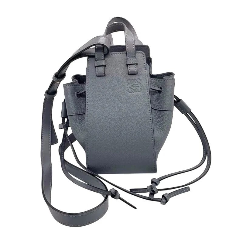 LOEWE HAMMOCK DRAWSTRING MINI HANDBAG: LOEWE Hammock Drawstring Mini Handbag Brand: LOEWE Type: Handbag Material: Pepplecalf Color: Gray x GD Hardware Size: W: 10.5cm / H: 19cm / D: 10.5cm / Shoulder: 106cm Accessories: None
