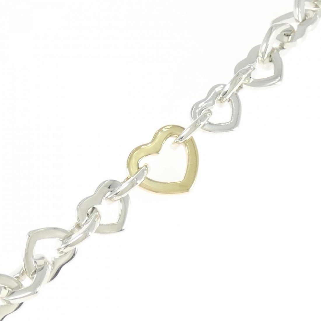 TIFFANY HEART LINK BRACELET: Tiffany Heart Link Bracelet Brand: Tiffany Type: Bracelet Material: 925 Silver 750 Yellow Gold, Color: SilverYellow Gold" Size: 19.5cmActualSize Max W: 13.5mm Accessories: None Accessories