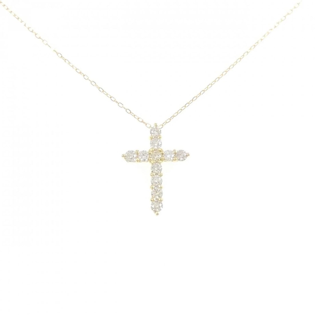 K18YG CROSS DIAMOND NECKLACE: K18YG Cross Diamond Necklace Brand: Unbranded Type: Necklace Material: K18 Yellow Gold, Main Stone/Creation Natural Color: YG Size: 40cmActualSize Pendant top H x W: 18.5mmx13.4mm Chain Max.