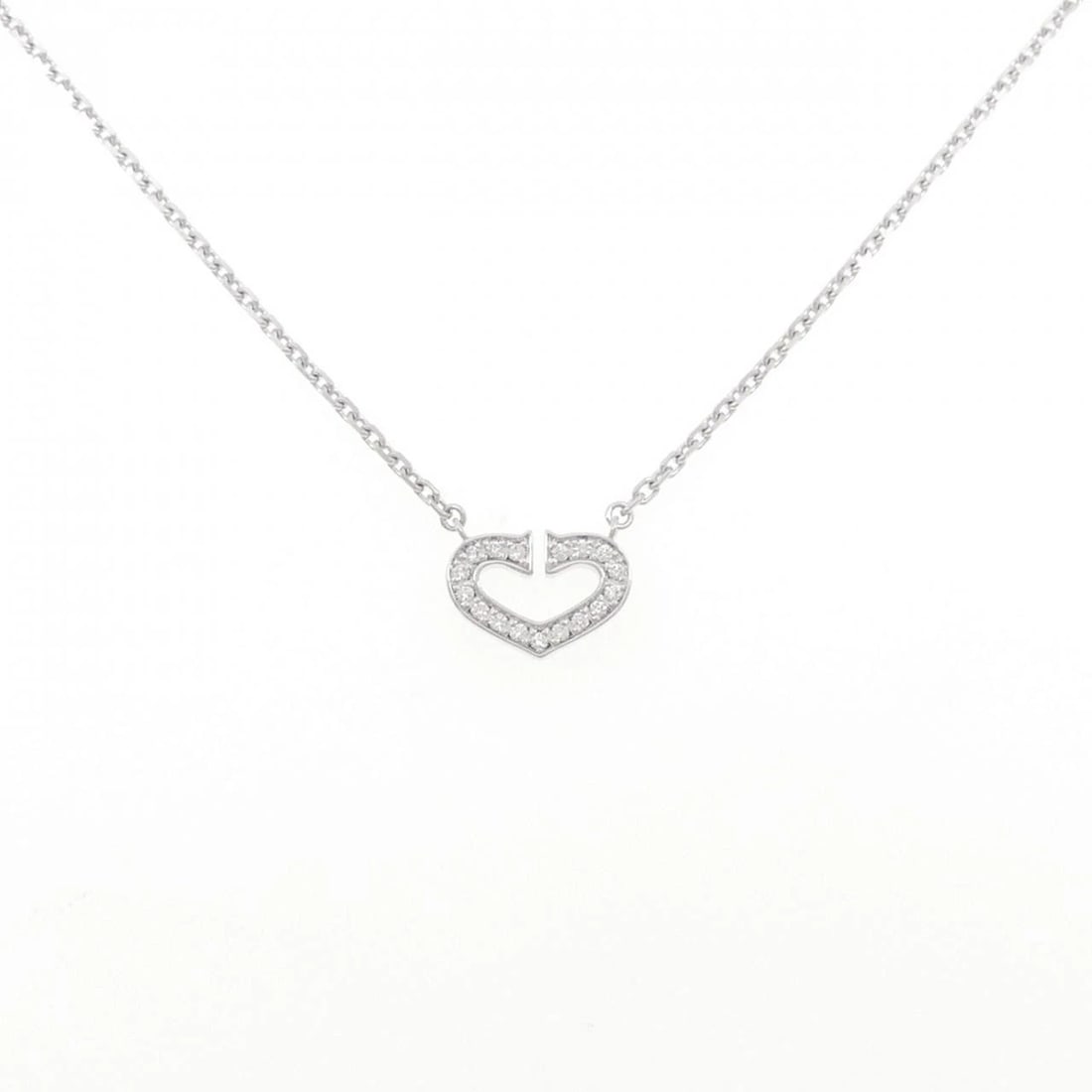 CARTIER C HEART NECKLACE: Cartier C Heart Necklace Brand: Cartier Type: Necklace Material: 750 White Gold, Main Stone/Creation Natural Color: White Gold Size: ActualSize Pendant top H x W: 9.1mmx12.2mm Chain Max. W: