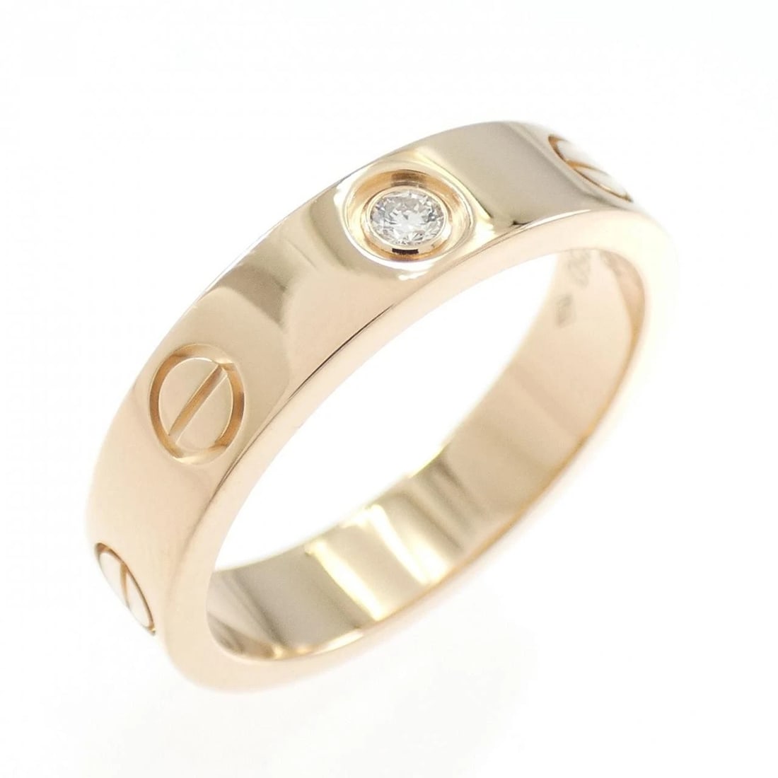 CARTIER MINI LOVE 1P RING: Cartier MINI LOVE 1P Ring Brand: Cartier Type: Ring Material: 750 Pink Gold, Main Stone/Creation Natural Color: Pink Gold Size: 4.5-5 (US size) Accessories: None Accessories Notice: When