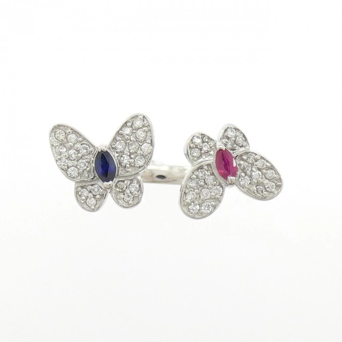 K18WG BUTTERFLY COLOR STONE RING: K18WG Butterfly Color Stone Ring Brand: Unbranded Type: Ring Material: K18 White Gold, Main Stone/Creation Ruby Sapphire Color: White Gold Size: 6-6.5 US Accessories: None Accessories Noti