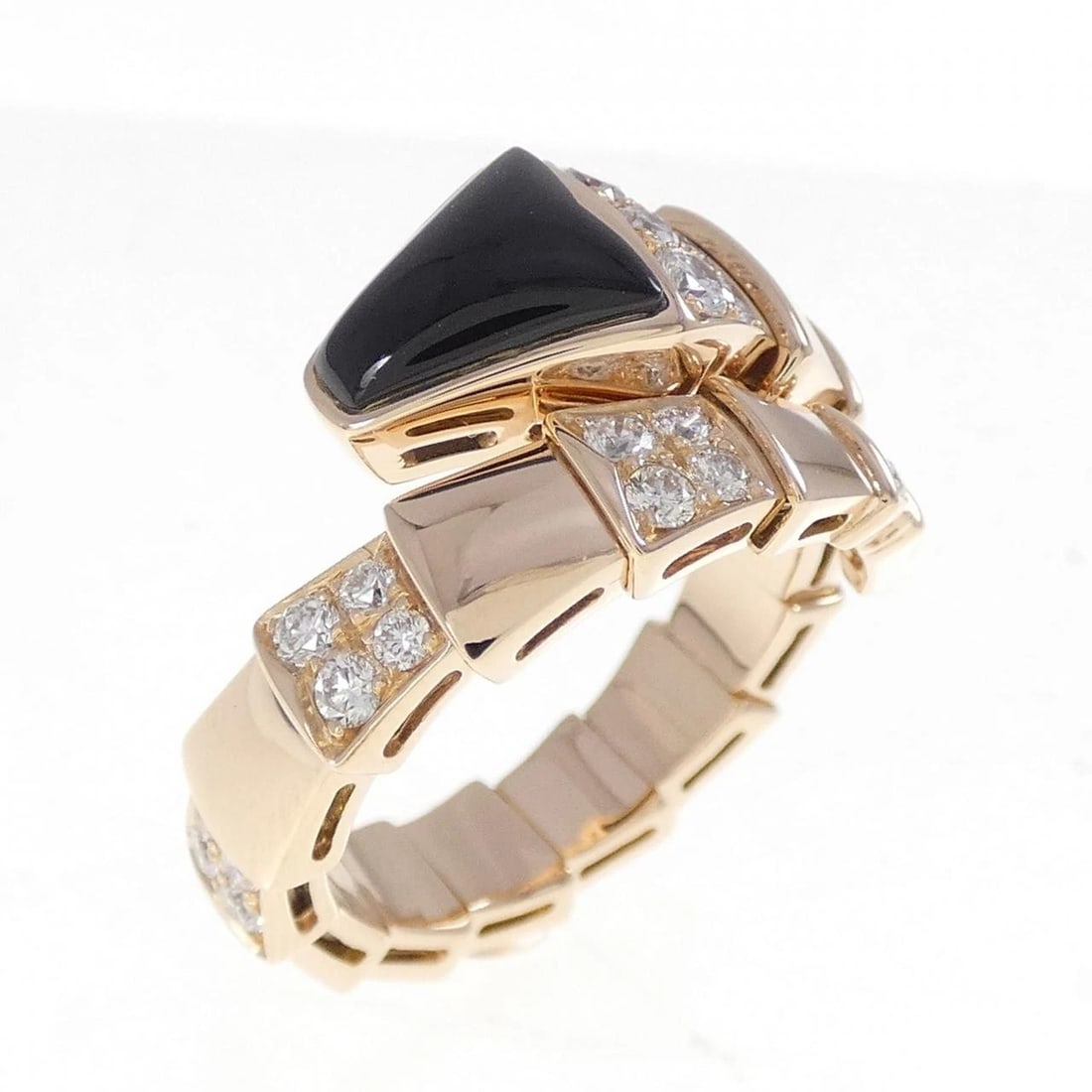 BVLGARI SERPENTI RING: BVLGARI Serpenti Ring Brand: BVLGARI Type: Ring Material: 750 Pink Gold, Main Stone/Creation Onyx Color: Pink Gold Size: 7-7.5 US Accessories: None Accessories Notice: When purchasing