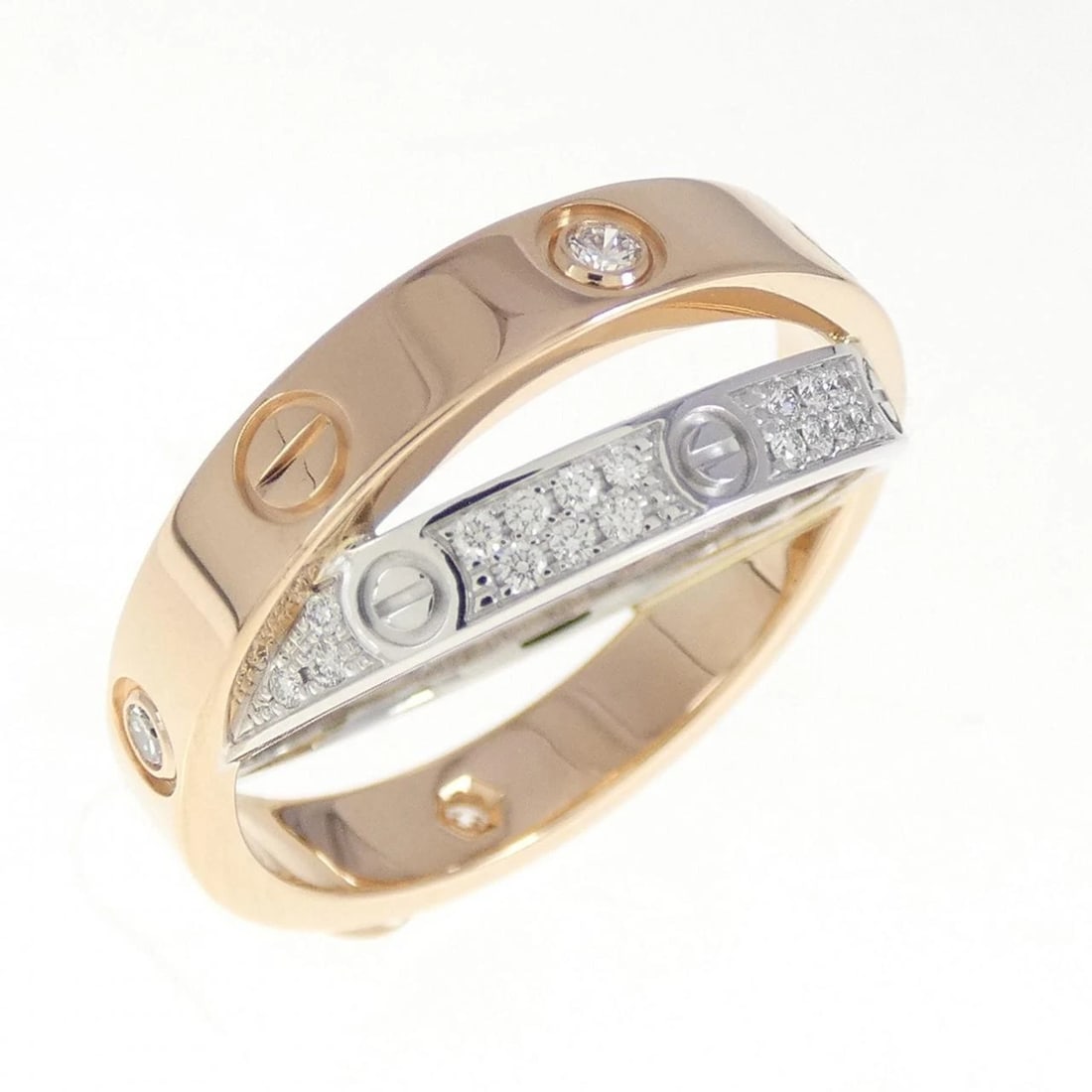 CARTIER LOVE RING: Cartier Love Ring Brand: Cartier Type: Ring Material: 750 Pink Gold 750 White Gold, Main Stone/Creation Natural Color: Pink Gold White Gold Size: 4.5-5 US Accessories: None Accessories Not