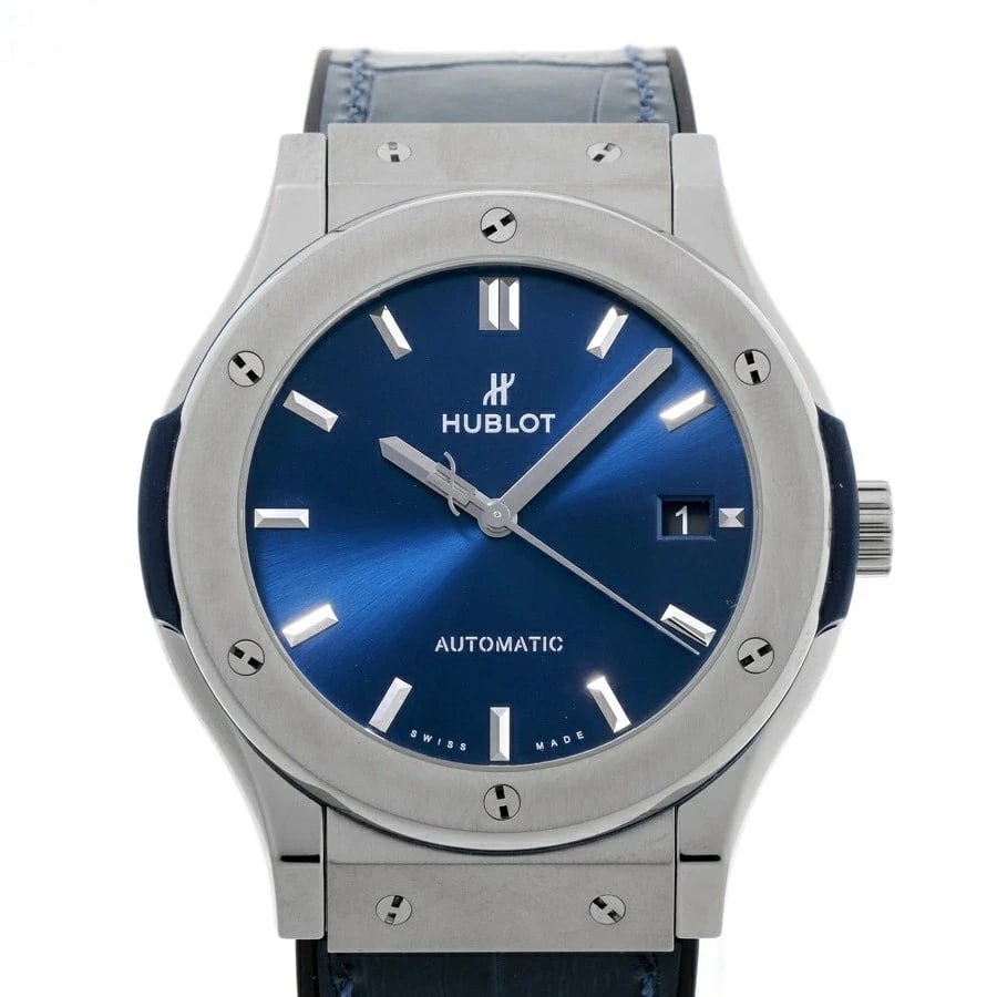 HUBLOT CLASSIC FUSION BLUE WATCH: HUBLOT Classic Fusion Blue Watch Brand: HUBLOT Type: Wrist watch Material: TITANIUM/RUBBER/LEATHER Color: Dial Color Blue Size: [ Size ] W: 45.0mm × H: 52.0mm × T: 10.9mm Lug: 19.0mm 