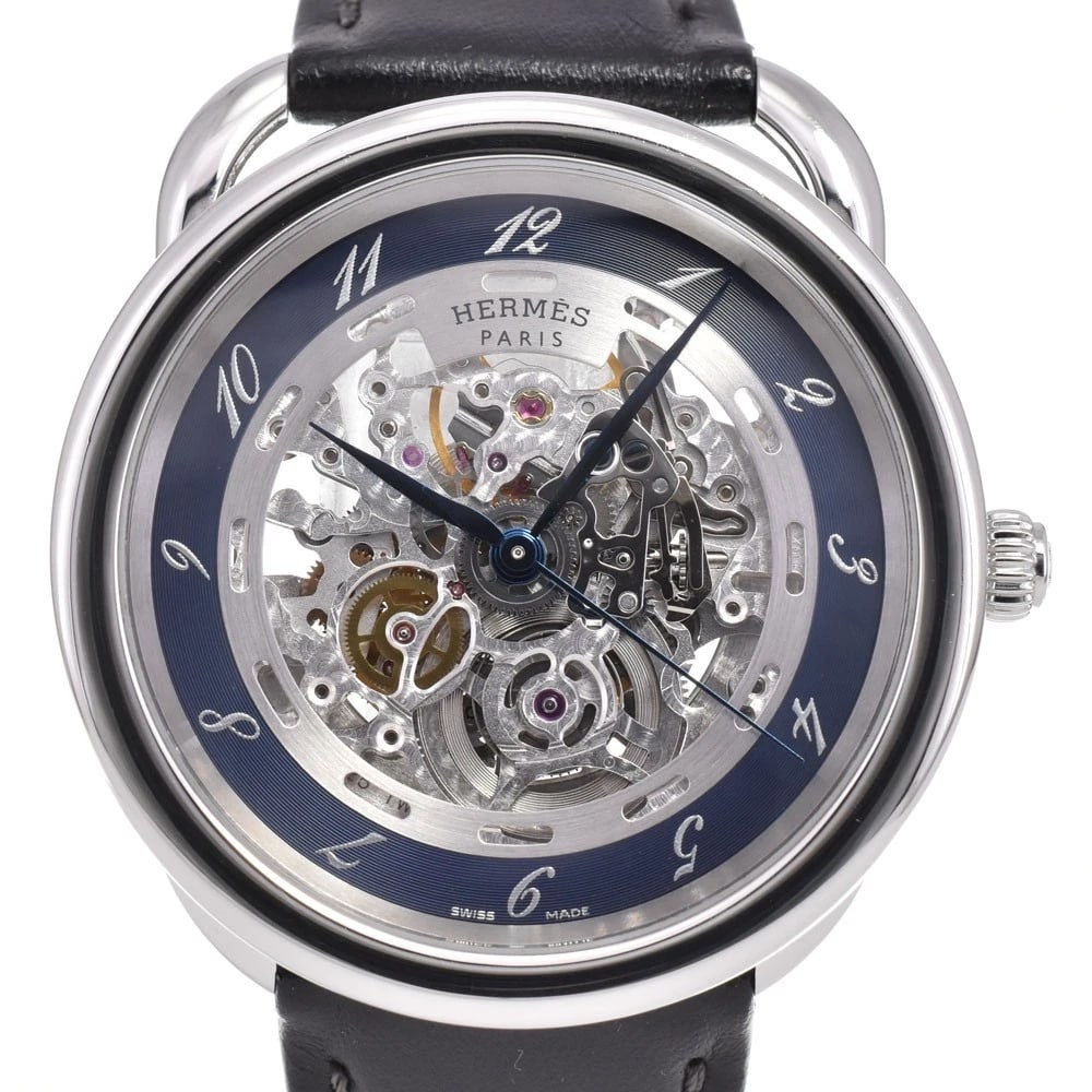 HERMES ARCEAU SKELETON WATCH: HERMES Arceau skeleton Watch Brand: HERMES Type: Wristwatch Material: Band Material leather, Case Material Stainless Steel Color: Dial Color Silver / Gray, Case Color Silver Band Color black 