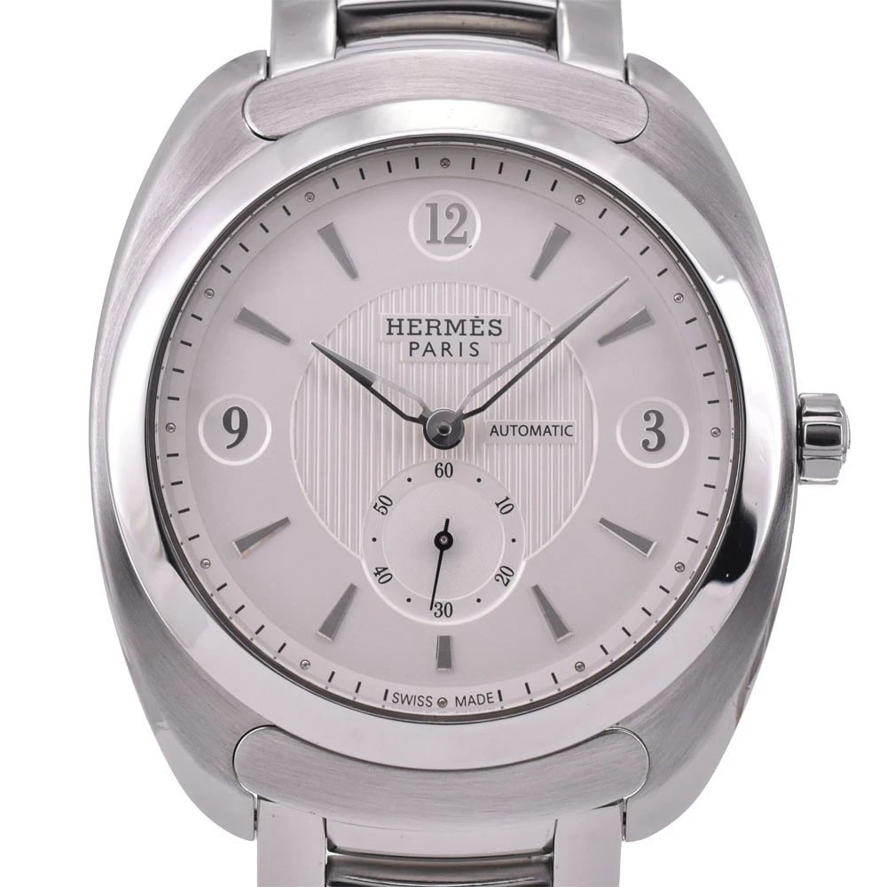 HERMES DRESSAGE SMALL WATCH: HERMES Dressage Small Watch Brand: HERMES Type: Wristwatch Material: Band Material Stainless Steel, Case Material Stainless Steel Color: Dial Color Silver, Case Color Silver Band Color Silver 