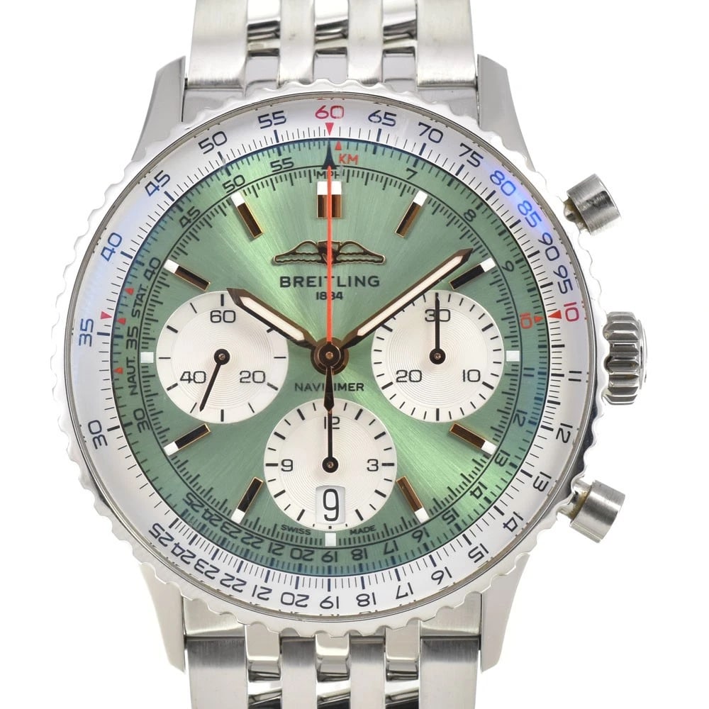 BREITLING NAVITIMER WATCH: BREITLING Navitimer Watch Brand: BREITLING Type: Wristwatch Material: Band Material Stainless Steel, Case Material Stainless Steel Color: Dial Color green, Case Color Silver Band Color Silver Size