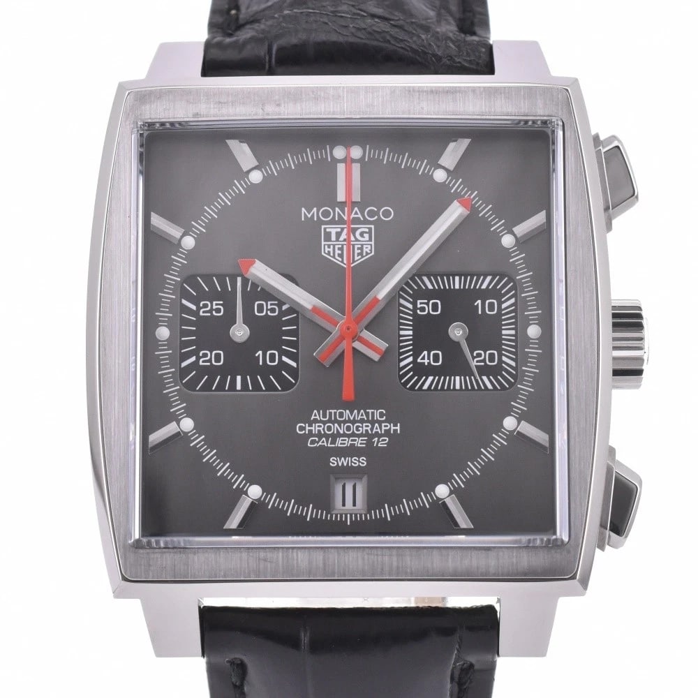TAG HEUER MONACO CHRONOGRAPH WATCH: TAG HEUER Monaco Chronograph Watch Brand: TAG HEUER Type: Wristwatch Material: Band Material leather, Case Material Stainless Steel Color: Dial Color black, Case Color Silver Band Color black 