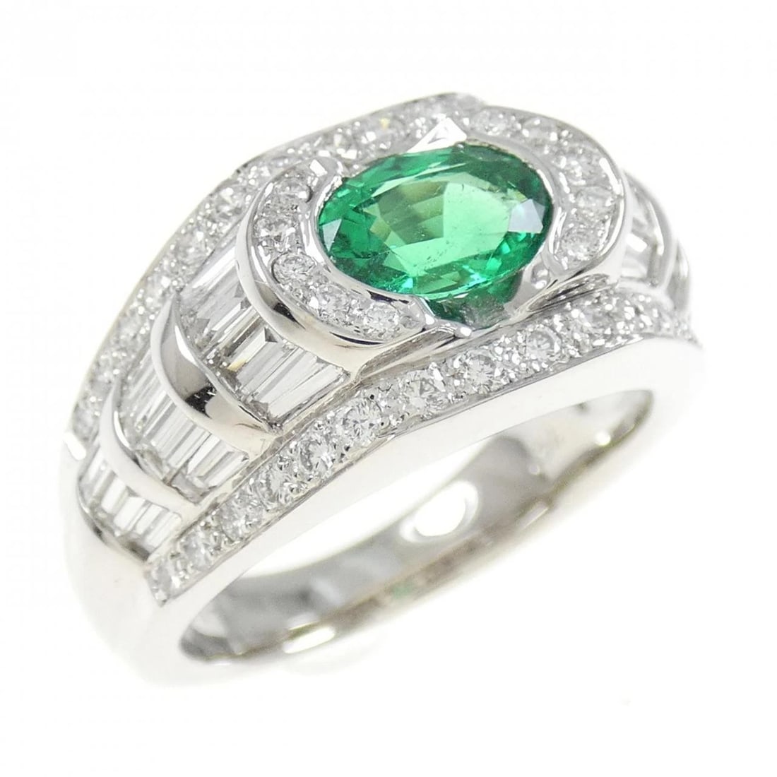 750WG EMERALD RING: 750WG Emerald Ring Brand: Unbranded Type: Ring Material: 750 White Gold, Main Stone/Creation Main Stone EmeraldSide Stone Diamond Color: White Gold Size: 7 ( US size) Accessories: None Acc