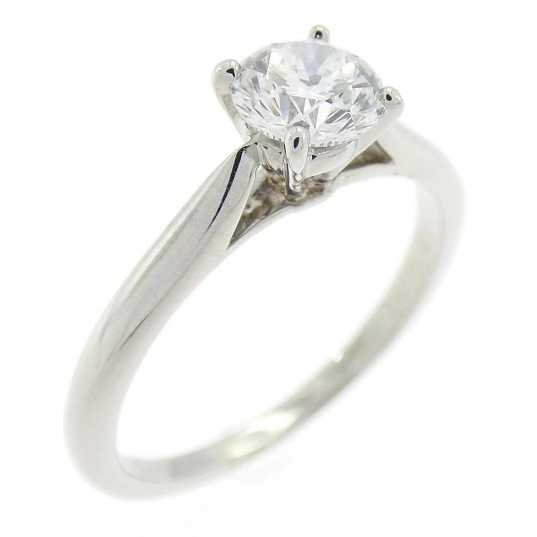 CARTIER SOLITAIRE RING: Cartier Solitaire Ring Brand: CARTIER Type: Ring Material: Platinum 950, Main Stone/Creation Natural Color: White Size: US 5 Accessories: None Accessories Notice: When purchasing pre-owned