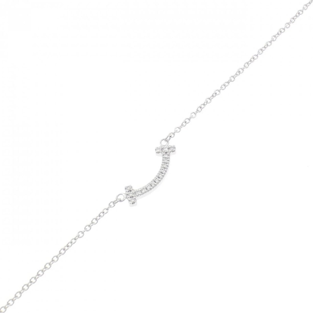 TIFFANY T SMILE MINI BRACELET: Tiffany T Smile mini Bracelet Brand: Tiffany Type: Bracelet Material: 750 White Gold, Main Stone/Creation Natural Color: White Gold Size: ActualSize Max W: 3.8mm Size18/23cm Accessories: None