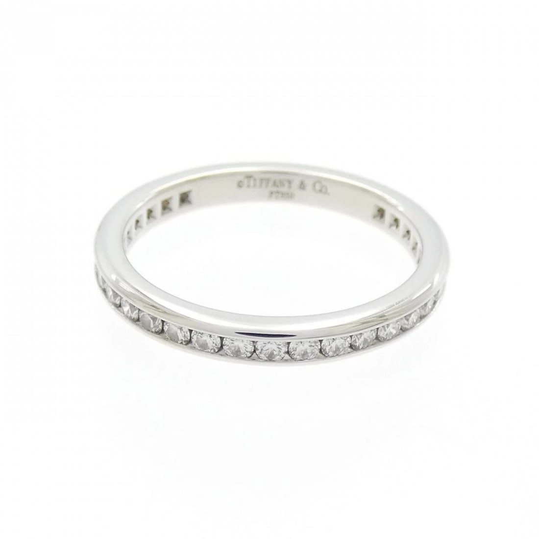 TIFFANY & CO. FULL CIRCLE CHANNEL SETTING RING: Tiffany & Co. Full Circle channel setting Ring Brand: Tiffany Type: Ring Material: Platinum 950, Main Stone/Creation Natural Color: White Size: 4-4.5 (US size) Accessories: None Accessories