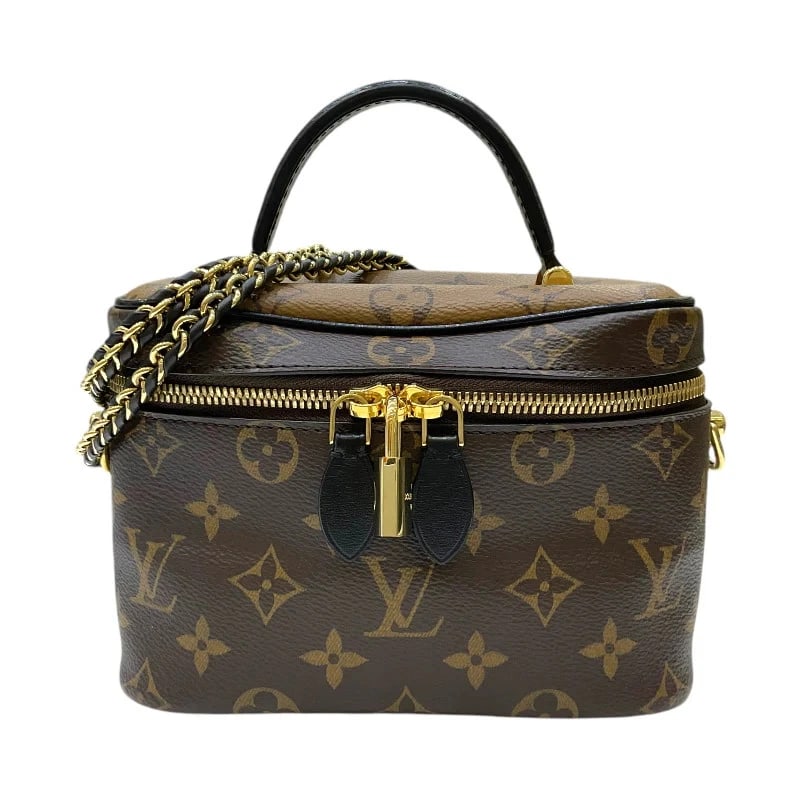 LOUIS VUITTON VANITY NV PM BROWN MONOGRAM HANDBAG: LOUIS VUITTON Vanity NV PM Brown Monogram Handbag Brand: LOUIS VUITTON Type: Handbag Material: Monogram Reverse Canvas/Leather Color: Brown Size: W: 19cm / H: 13cm / D: 11cm / Shoulder: 105cm Acc