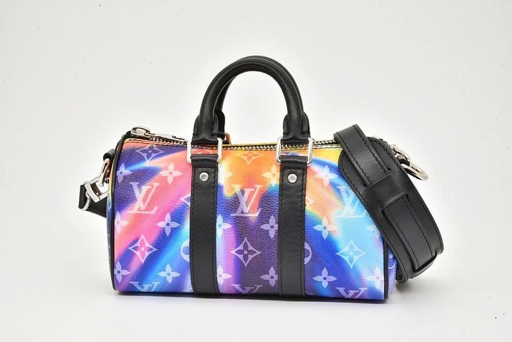 LOUIS VUITTON MONOGRAM SUNSET KEEPALL XS MINI BOSTON HANDBAG: Louis Vuitton Monogram Sunset Keepall XS Mini Boston Handbag Brand: Louis Vuitton Type: Handbag Material: Monogram Sunset Canvas Color: Multicolor Size: W21xH12.5xD9cm / Shoulder strap: 108-131cm