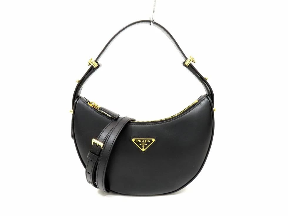 PRADA BLACK PRADA ARCHE SMALL SHOULDER BAG HANDBAG: Prada Black Prada Arche Small Shoulder Bag Handbag Brand: Prada Type: Handbag Material: Leather Black Color: Black Size: H: 18.5cm D: 22.5cm G: 6cm / Shoulder: / Strap 93cm-83cm Accessories: None