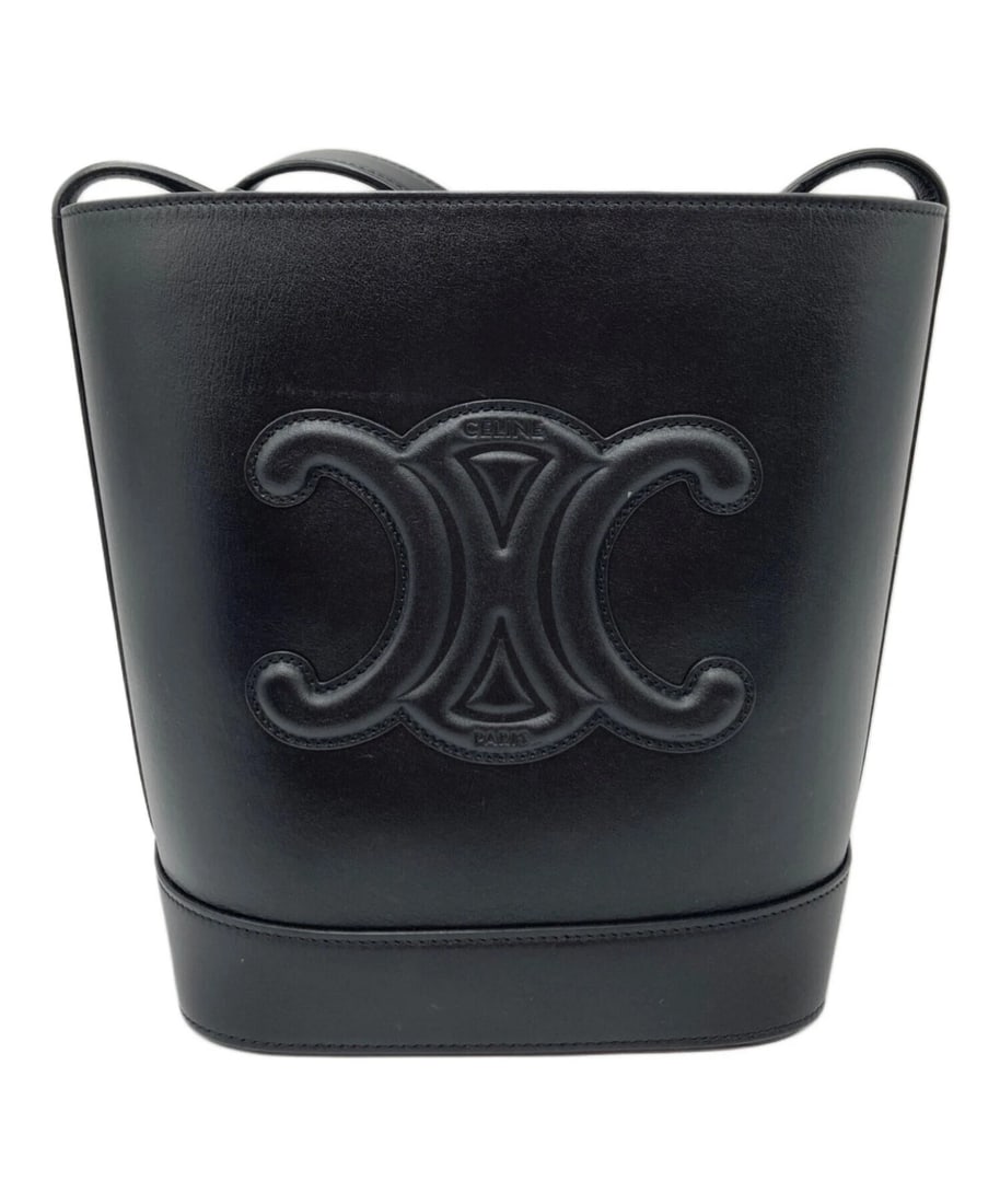 CELINE SMALL BUCKET TRIOMPHE LEATHER HANDBAG: CELINE Small Bucket Triomphe Leather Handbag Brand: CELINE Type: Handbag Material: none Color: Black Size: H:22cm / W:3.5cm / D:13cm Accessories: None Accessories Notice: When purchasing