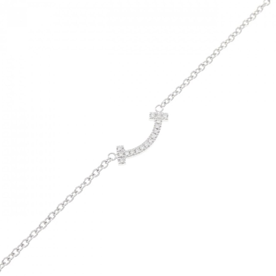 TIFFANY T SMILE MINI BRACELET: Tiffany T Smile mini Bracelet Brand: Tiffany Type: Bracelet Material: 750 White Gold, Main Stone/Creation Natural Color: White Gold Size: ActualSize Max W: 3.6mm Size15.5cm Accessories: None