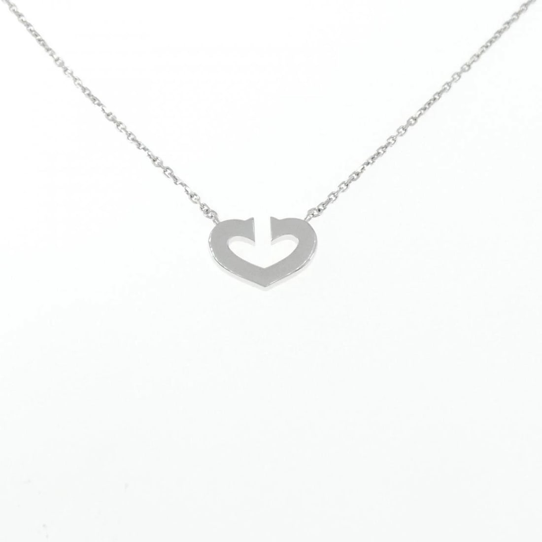 CARTIER C HEART NECKLACE: Cartier C Heart Necklace Brand: Cartier Type: Necklace Material: 750 White Gold, Color: White Gold Size: ActualSize Pendant top H x W: 11.9mmx16.5mm Chain Max. W: 1.4mm Size40cm Accessories: